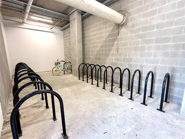 a picture of a room with a bench and a picture of the side of a wall