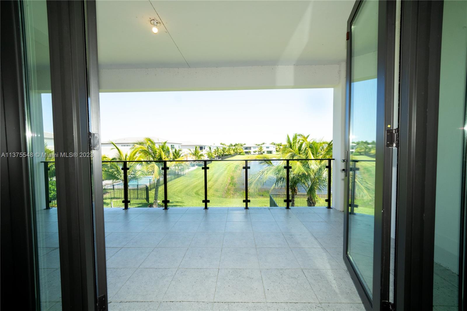 17232 Teton River Road Boca Raton, FL 33496 - Photo 17 of 28 a view of ocean from a balcony