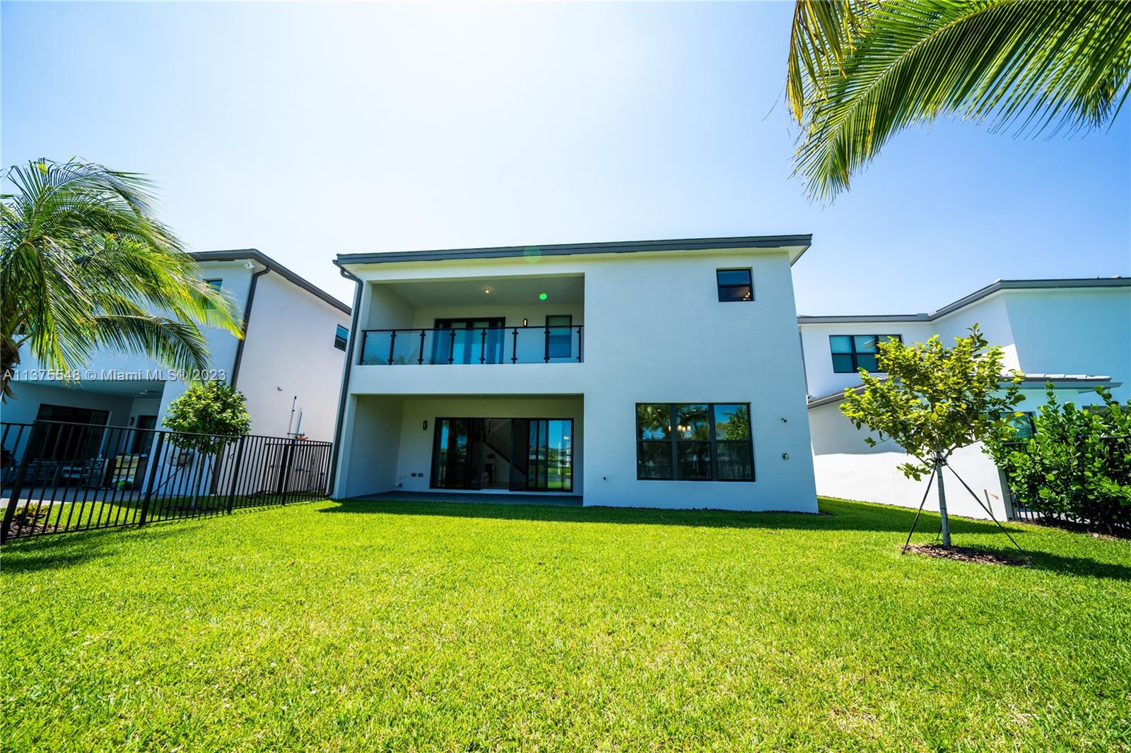 17232 Teton River Road Boca Raton, FL 33496 - Photo 18 of 28 a front view of house with yard and garage
