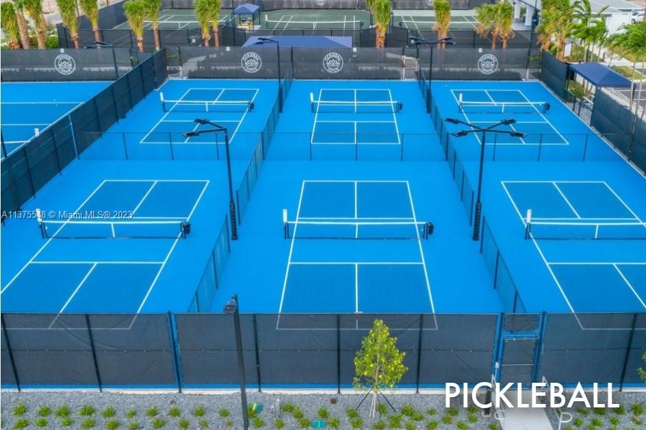 17232 Teton River Road Boca Raton, FL 33496 - Photo 22 of 28 a view of a balcony with door and wooden floors