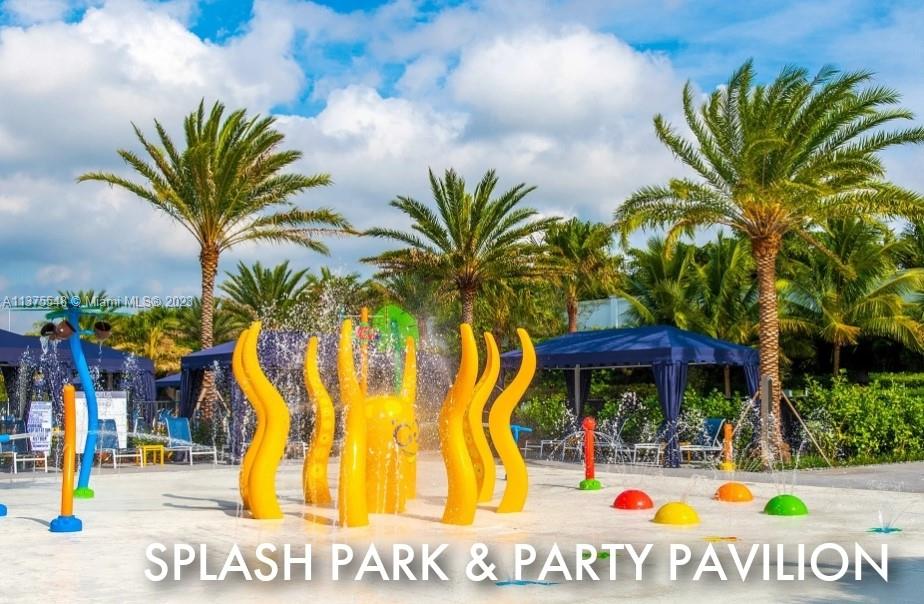 17232 Teton River Road Boca Raton, FL 33496 - Photo 26 of 28 a view of swimming pool with a table and chairs under an umbrella
