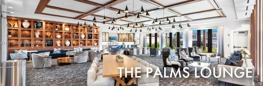 17232 Teton River Road Boca Raton, FL 33496 - Photo 27 of 28 a living room with lots of furniture and a chandelier