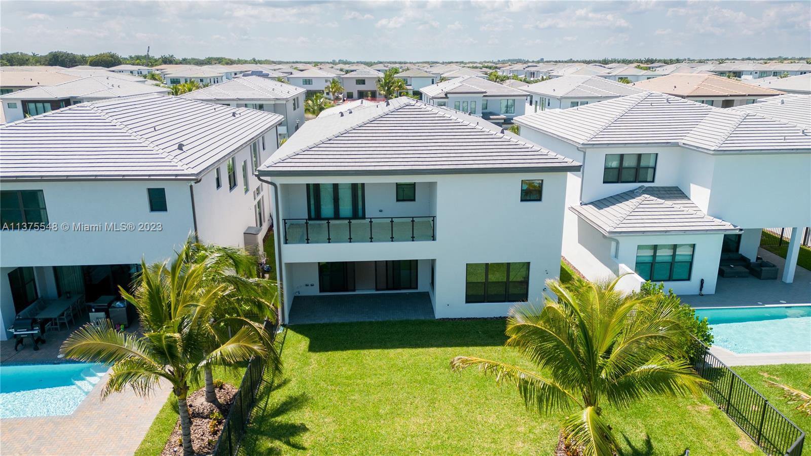 17232 Teton River Road Boca Raton, FL 33496 - Photo 3 of 28 a front view of a house with a yard