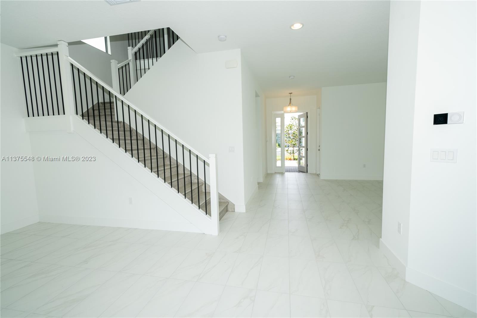 17232 Teton River Road Boca Raton, FL 33496 - Photo 9 of 28 a view of a hallway with staircase