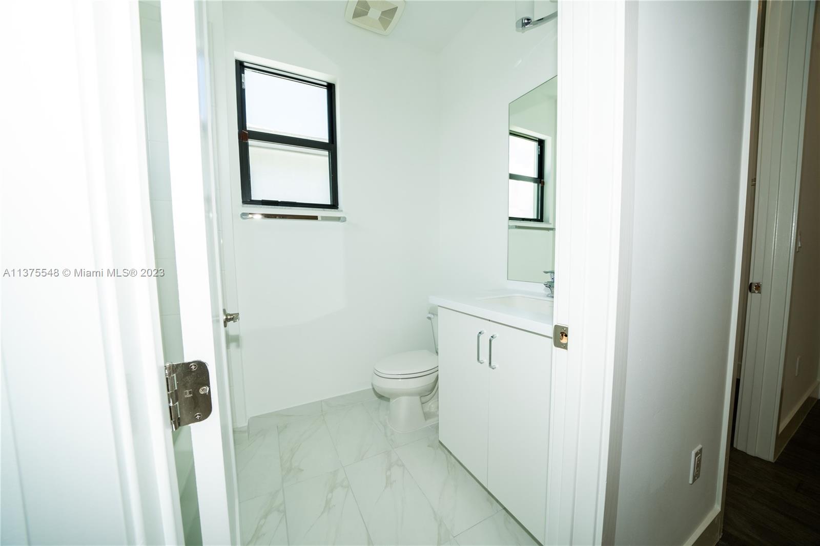 17232 Teton River Road Boca Raton, FL 33496 - Photo 10 of 28 a bathroom with a toilet