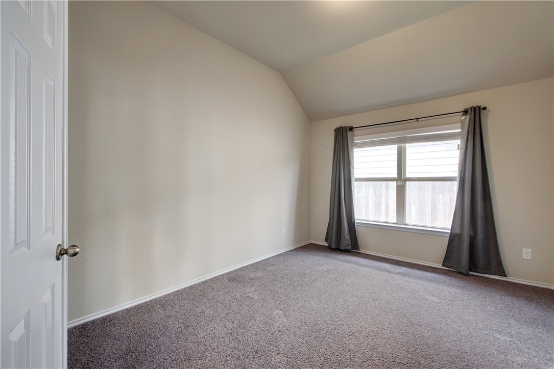 104 Finley Street Hutto, TX 78634 - Photo 13 of 37 a view of an empty room with a window