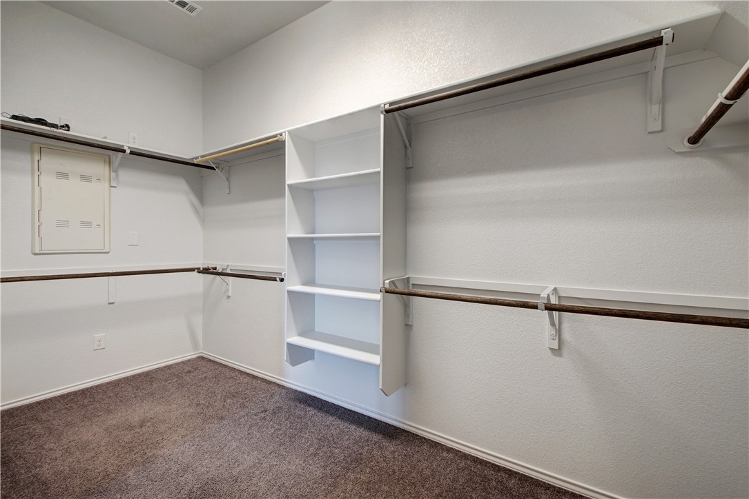 104 Finley Street Hutto, TX 78634 - Photo 17 of 37 a view of an empty walk in closet