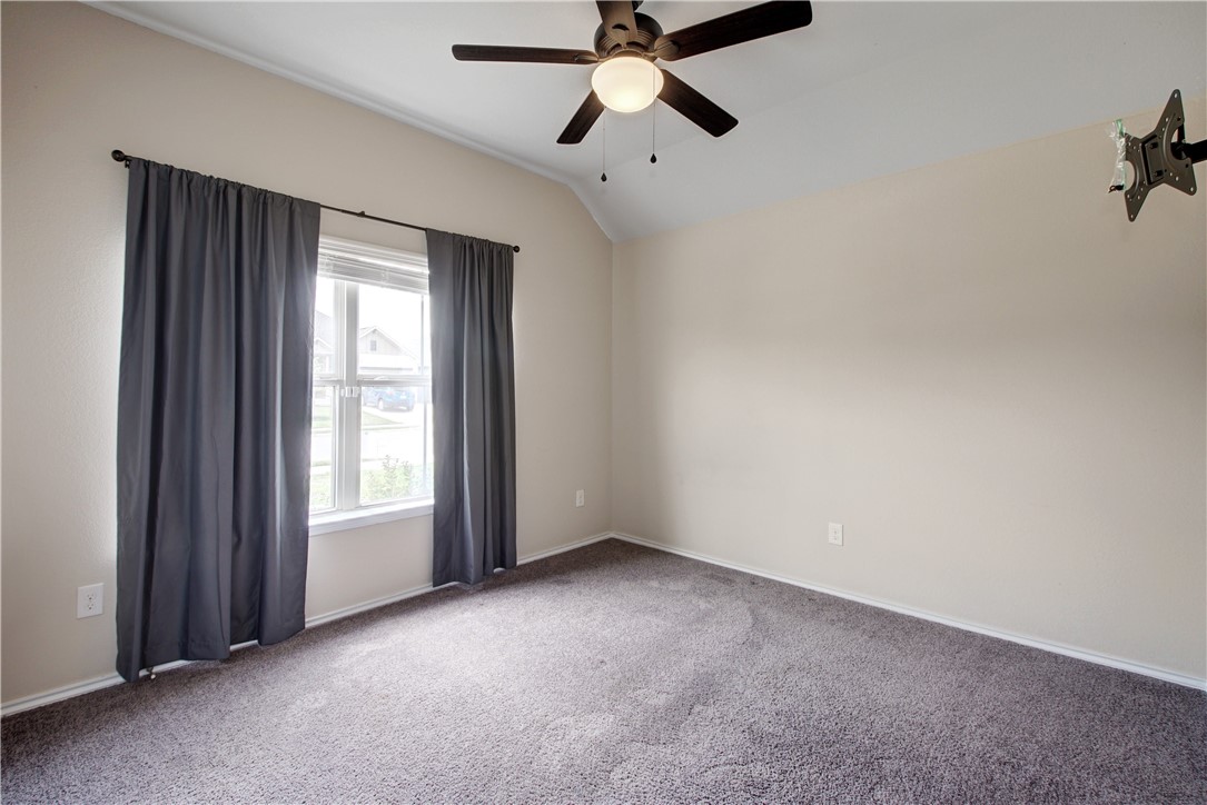 104 Finley Street Hutto, TX 78634 - Photo 19 of 37 a view of room with a ceiling fan