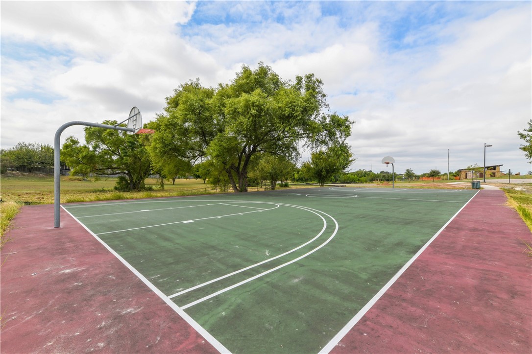 104 Finley Street Hutto, TX 78634 - Photo 32 of 37 a view of a tennis court