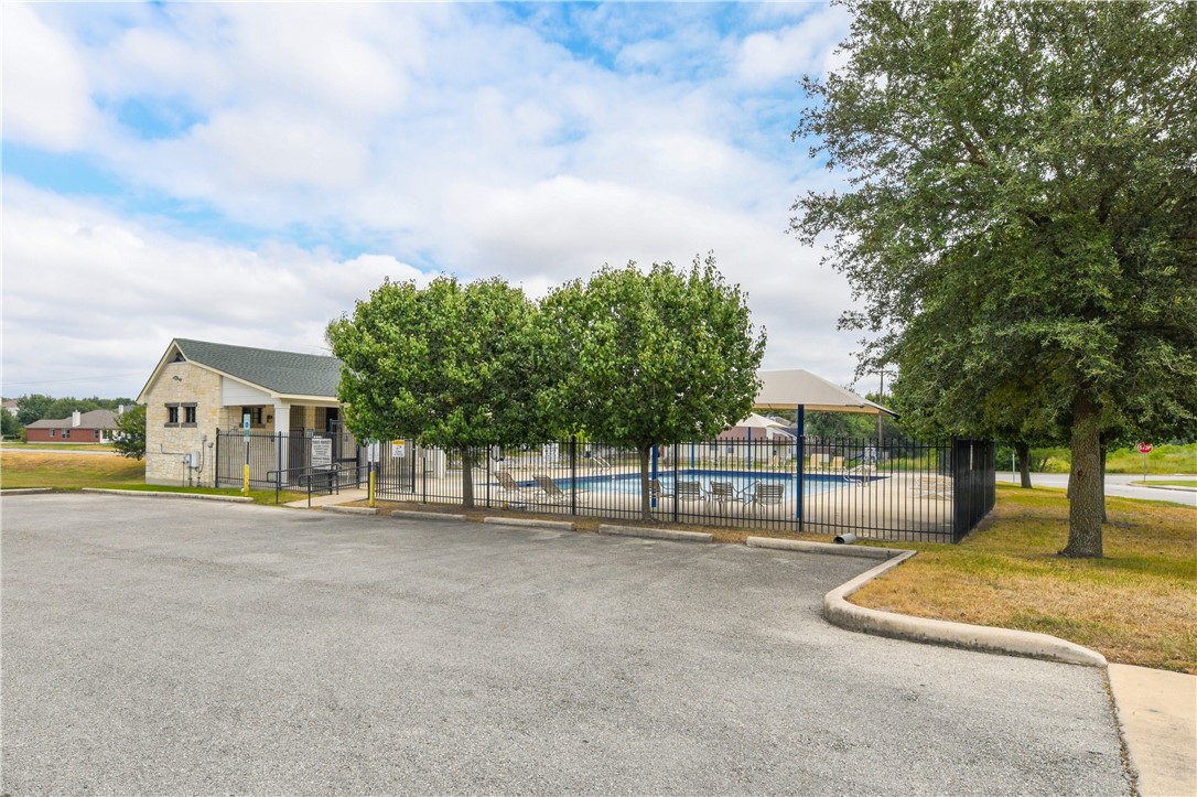 104 Finley Street Hutto, TX 78634 - Photo 35 of 37 a view of a house with palm trees