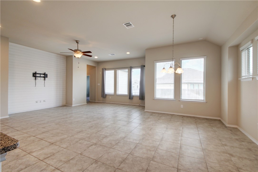 104 Finley Street Hutto, TX 78634 - Photo 5 of 37 a view of an empty room with a window
