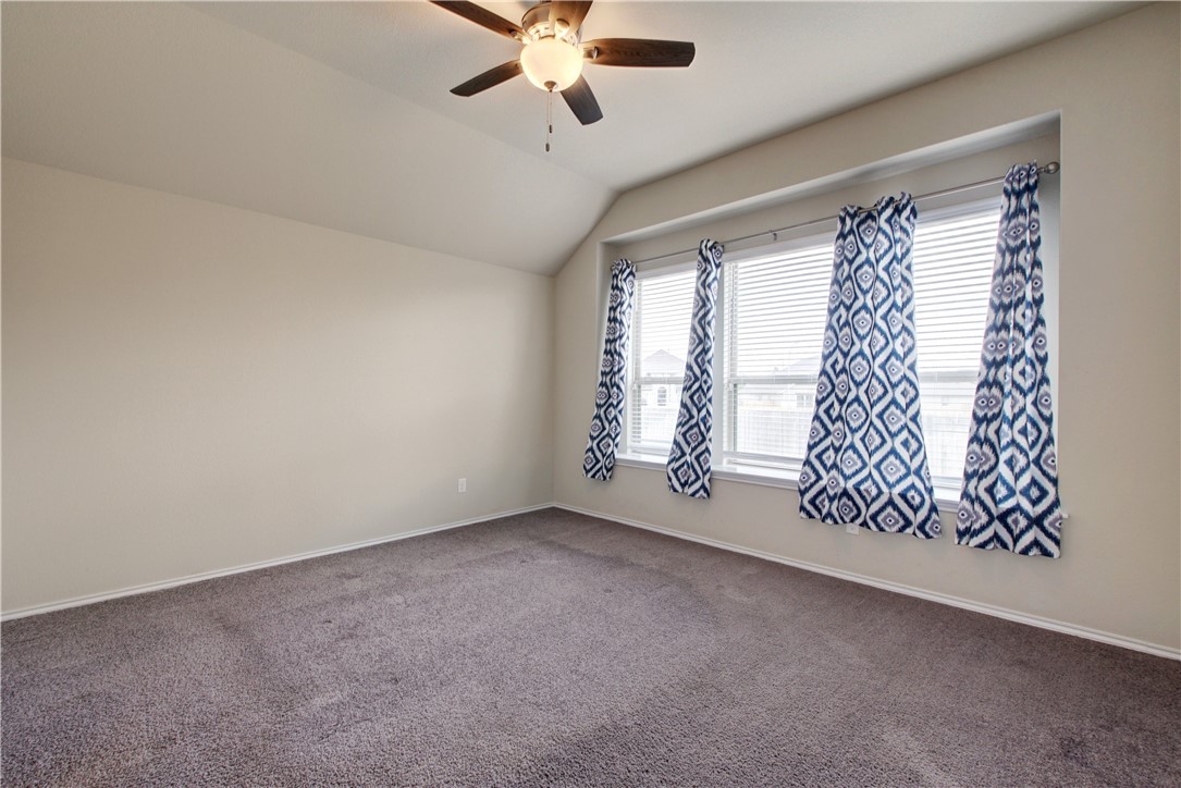 104 Finley Street Hutto, TX 78634 - Photo 10 of 37 en empty room with windows