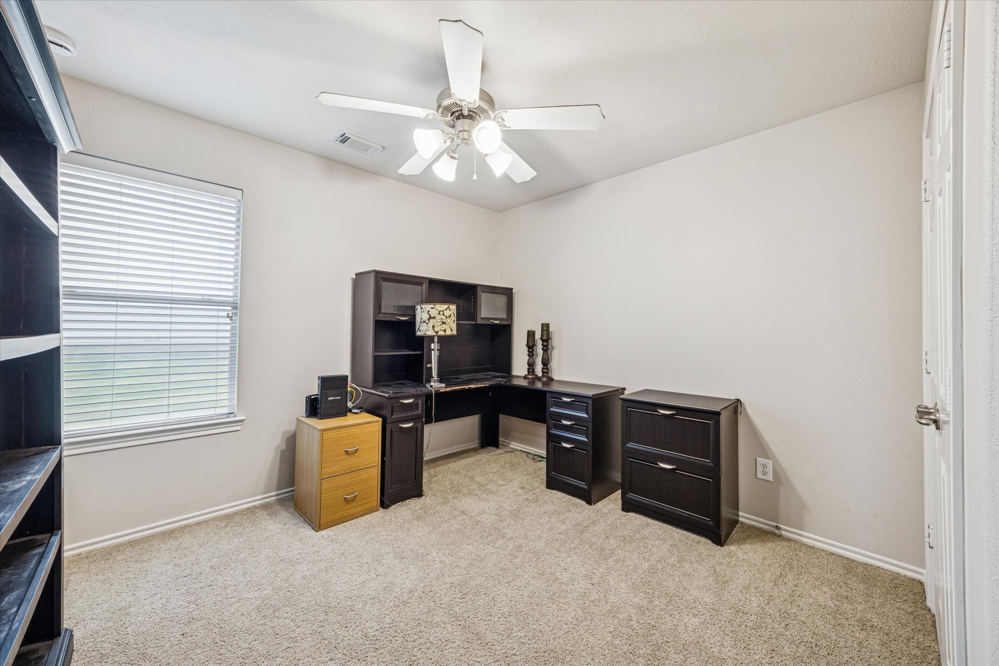 3206 Pearl Bluff Lane Houston, TX 77047 - Photo 16 of 20 workspace with furniture and window