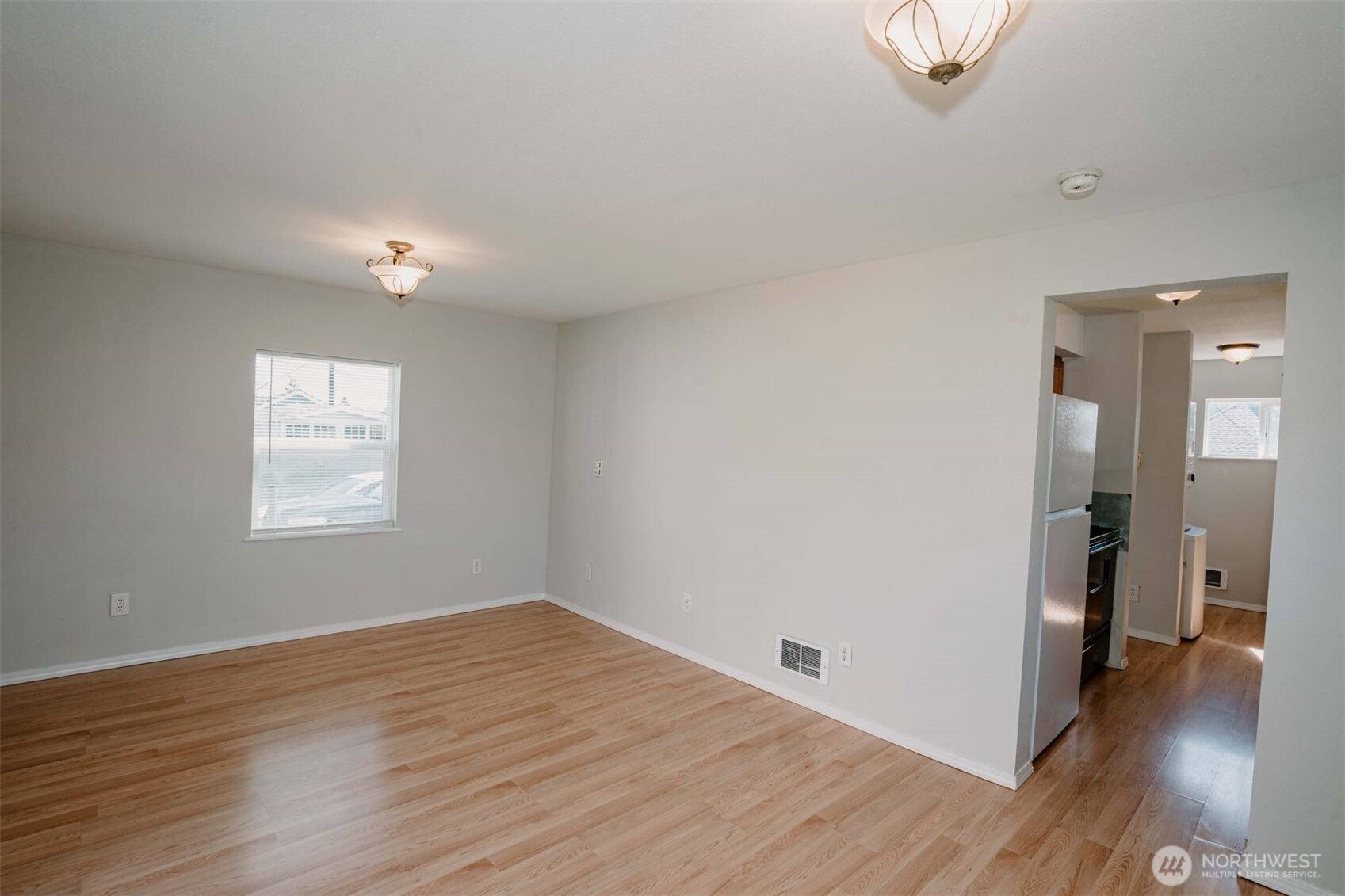 2220 Summit Avenue Everett, WA 98201 - Photo 10 of 26 wooden floor in an empty room with a window