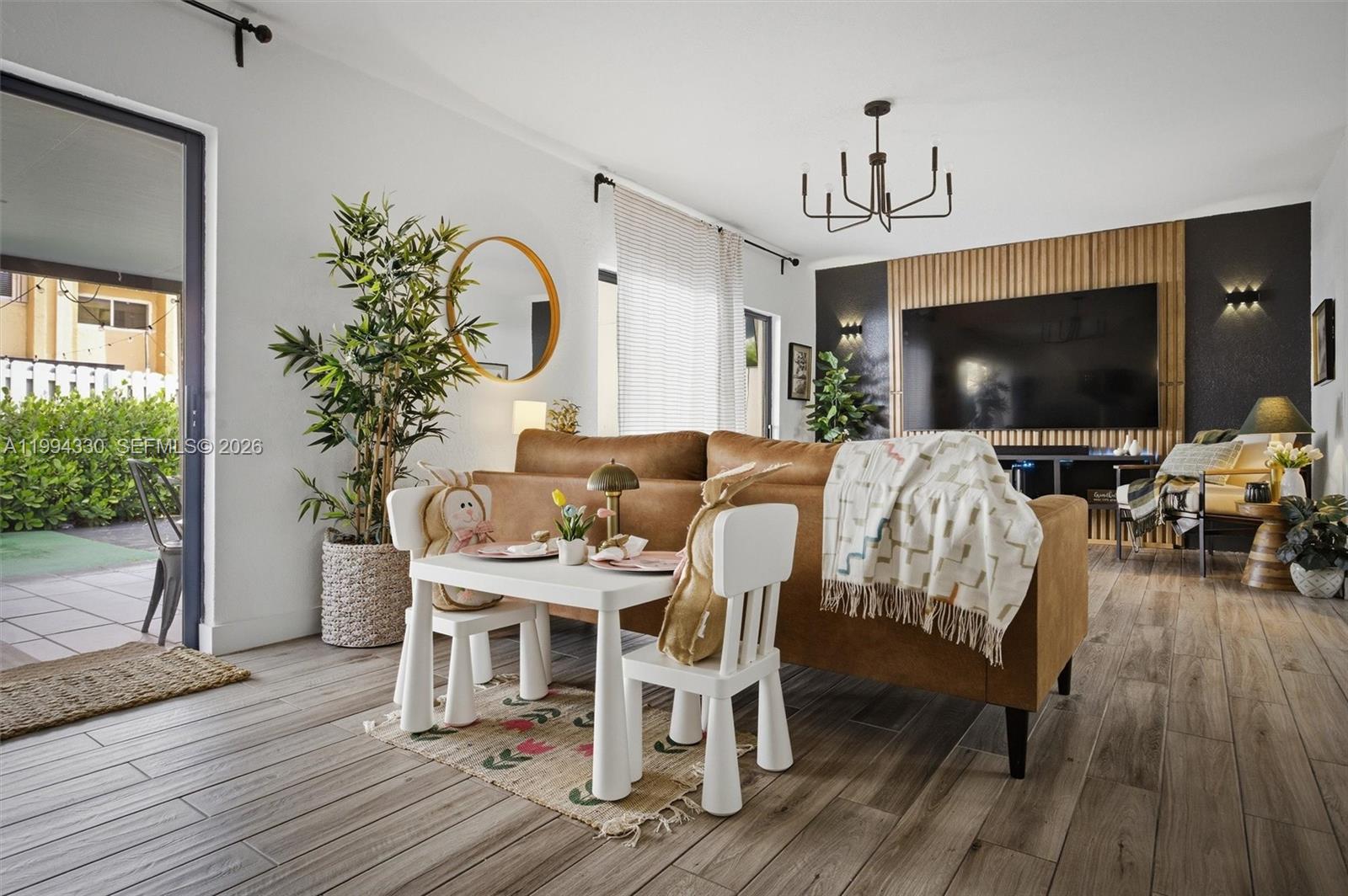 14019 Southwest 67th Terrace Miami, FL 33183 - Photo 14 of 36 a view of a dining room with furniture and wooden floor