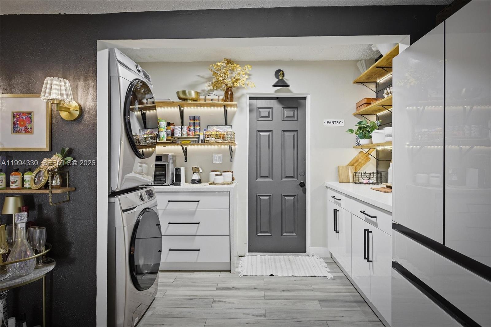 14019 Southwest 67th Terrace Miami, FL 33183 - Photo 18 of 36 a view of a hallway and a dining room