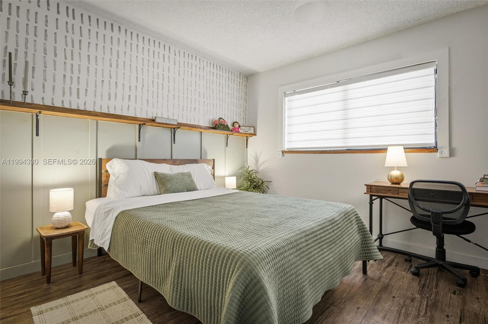 14019 Southwest 67th Terrace Miami, FL 33183 - Photo 26 of 36 a bedroom with a bed and a window