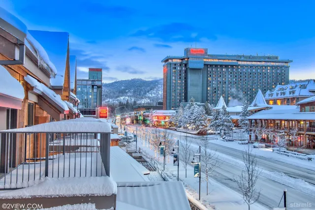 a view of a balcony with city view