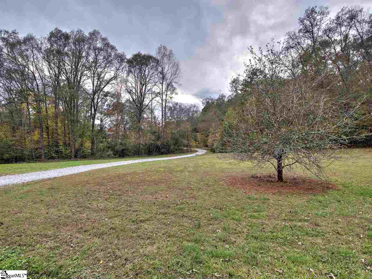 55 Arnold Branch Road Woodruff, SC 29388 - Photo 2 of 36 Welcome home and wind up your private drive leaving the hectic day behind.