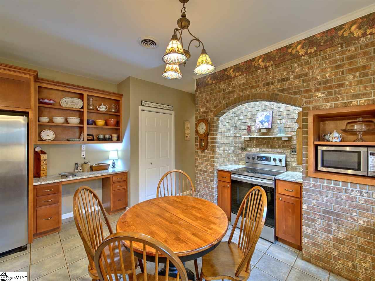 55 Arnold Branch Road Woodruff, SC 29388 - Photo 13 of 36 Brick arch over range area creates architectural interest.