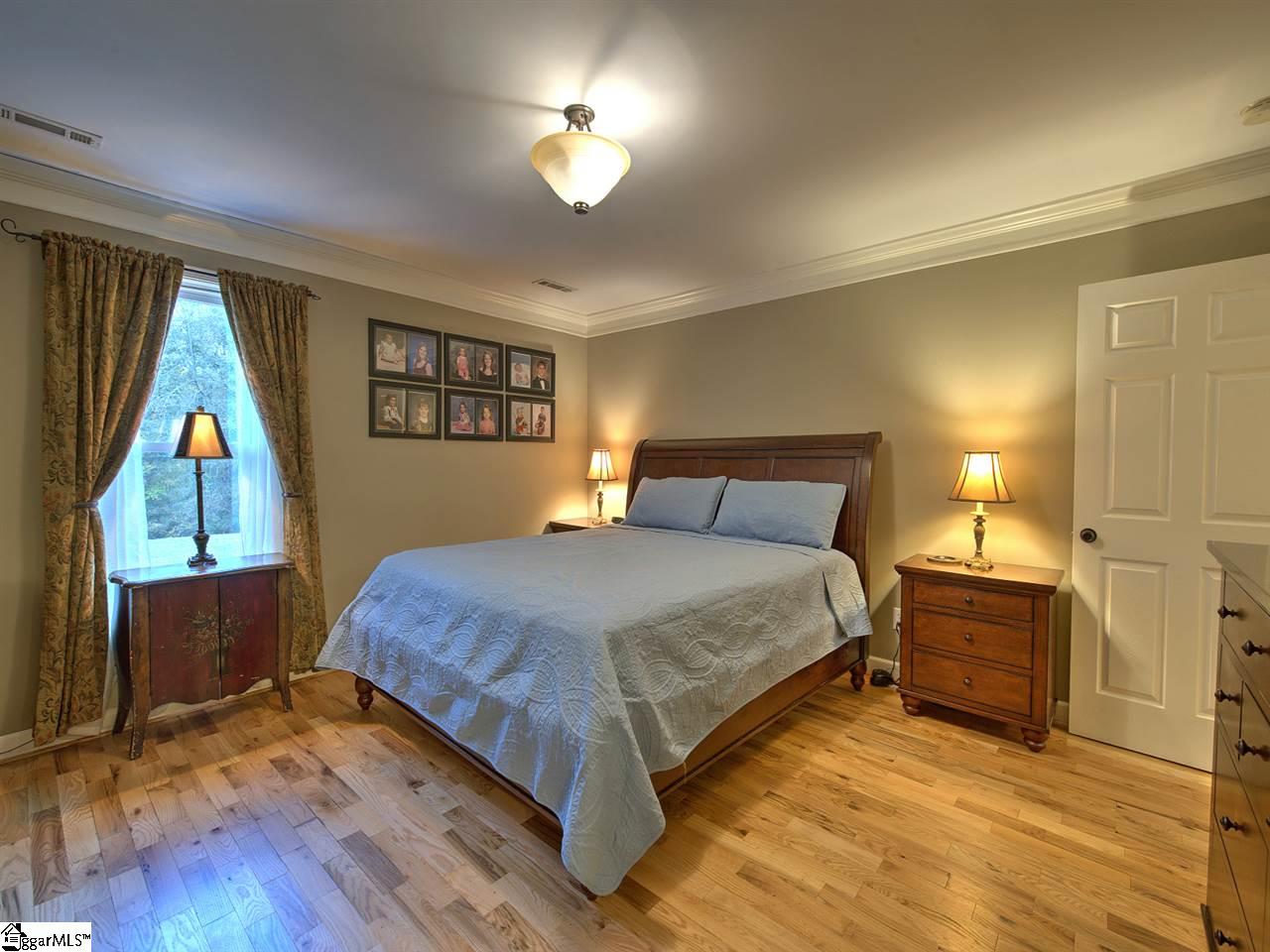 55 Arnold Branch Road Woodruff, SC 29388 - Photo 14 of 36 Spacious room with hardwoods...full bath and LARGE walk-in closet.