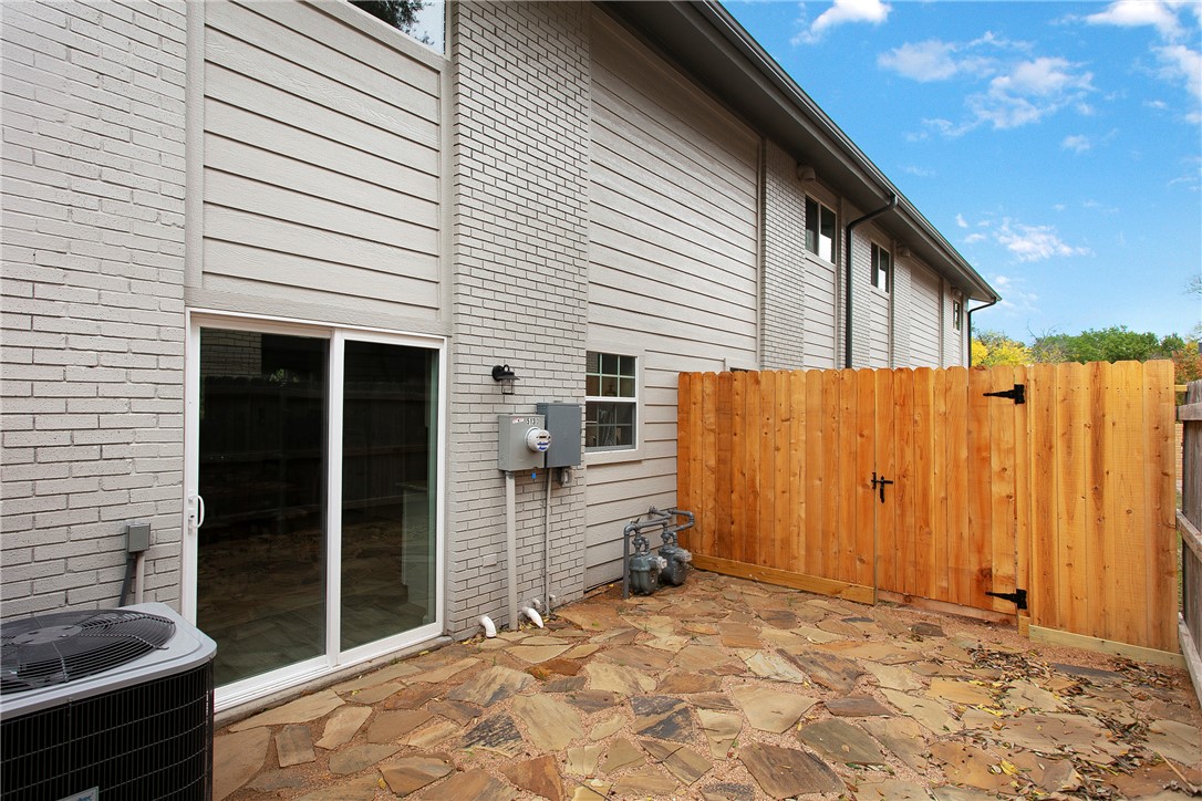 513 Boyett Street, Unit 2 College Station, TX 77840 - Photo 18 of 22 a view of a house with a backyard