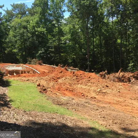 a view of a yard covered in snow