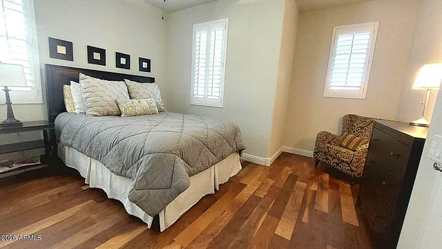 a view of a house with backyard porch and sitting area