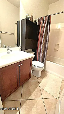 a view of a patio with table and chairs and potted plants