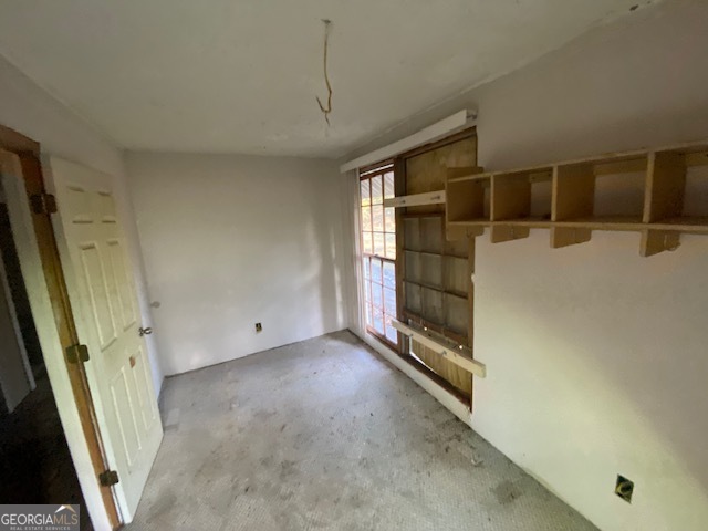 3011 Clack Road Madison, GA 30650 - Photo 13 of 27 a view of an empty room with a fireplace