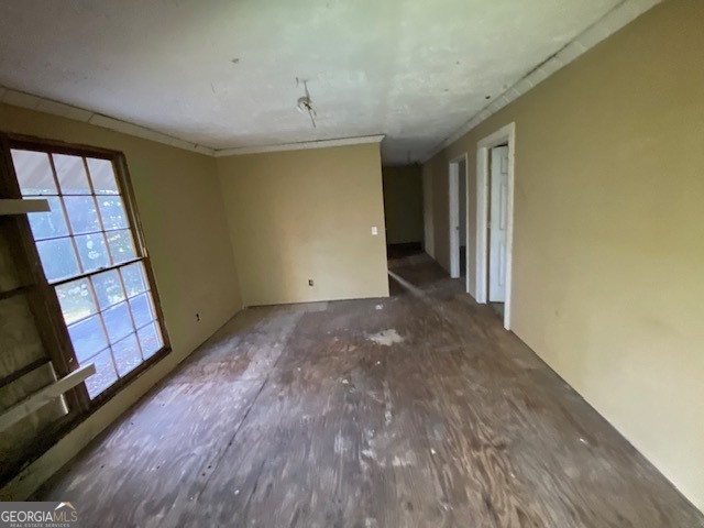 3011 Clack Road Madison, GA 30650 - Photo 15 of 27 a view of an empty room with a window