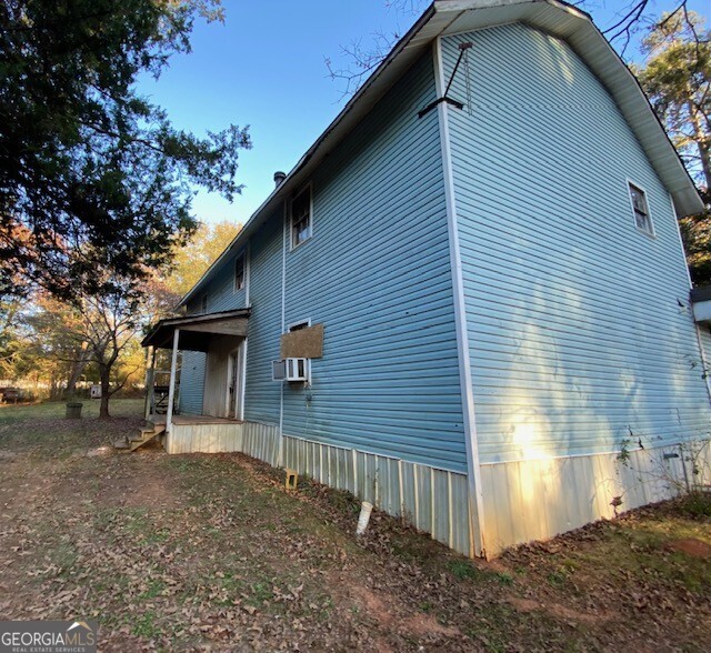 3011 Clack Road Madison, GA 30650 - Photo 20 of 27 a view of a house with a backyard