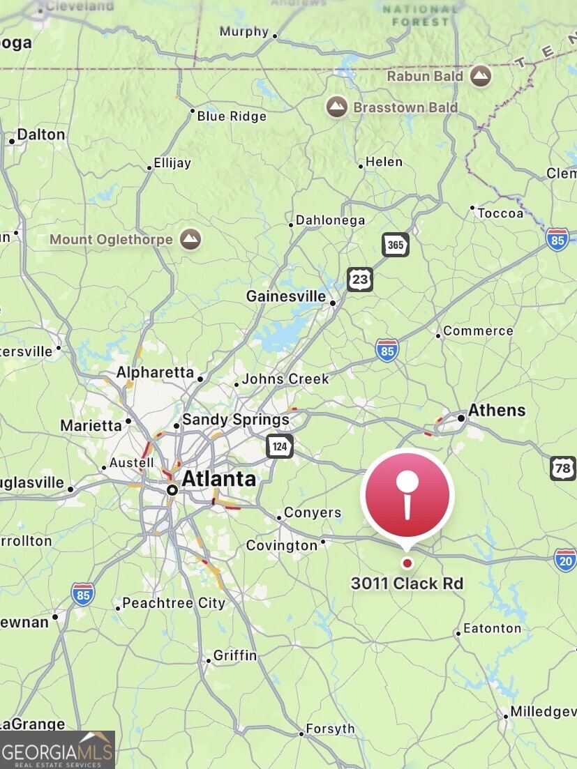 3011 Clack Road Madison, GA 30650 - Photo 27 of 27 a sign that is sitting in a kitchen