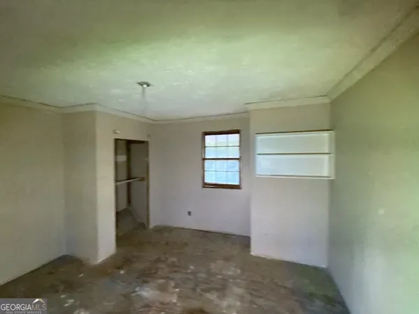 an empty room with windows