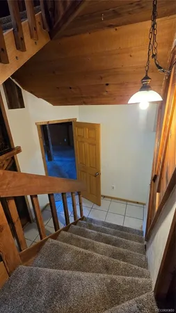 a view of a hallway with windows