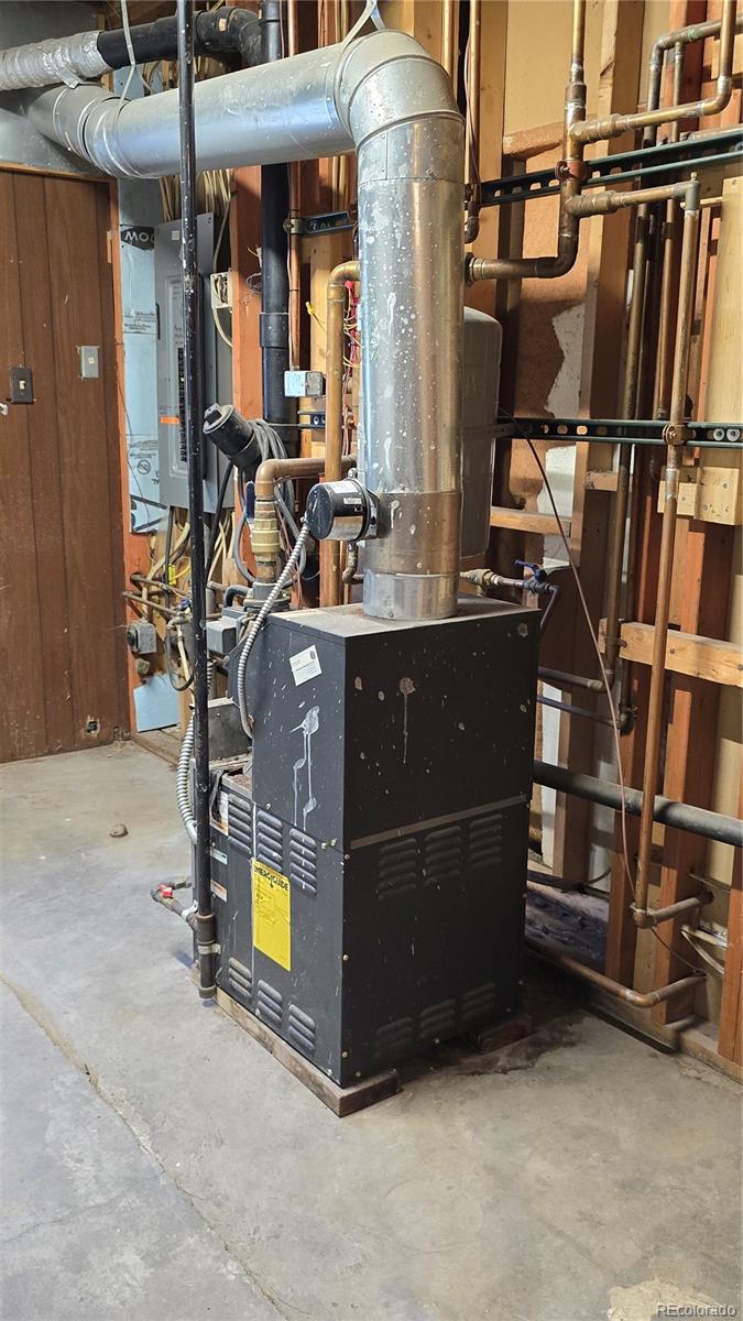 Undisclosed Address Nathrop, CO 81236 - Photo 39 of 50 a room with lots of wooden furniture