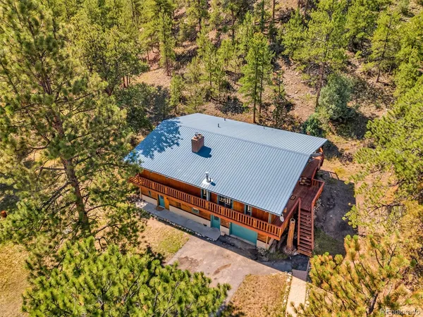 a view of a roof deck with a tree