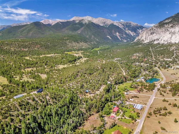 a view of a mountain with a mountain in the background