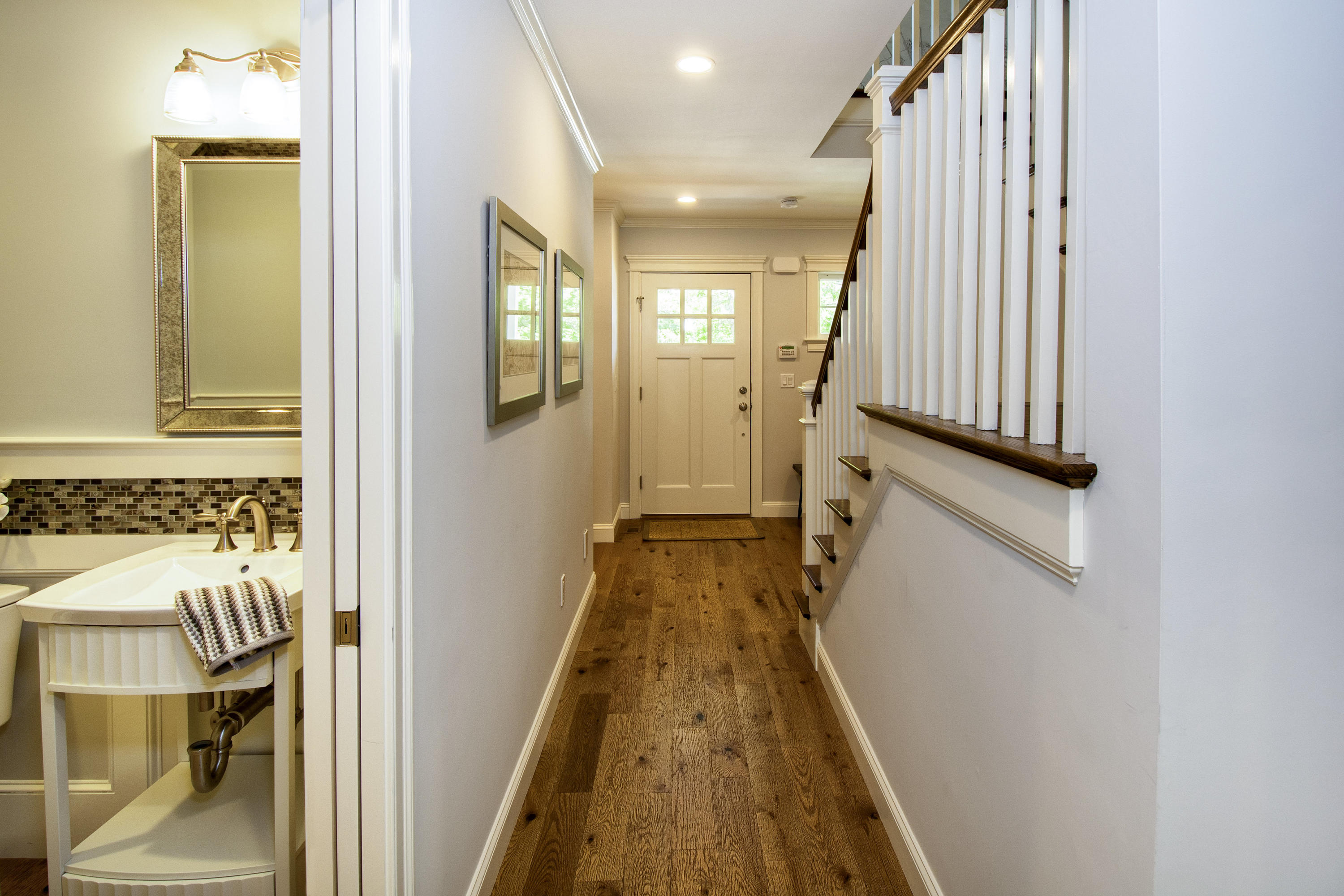 2 Cobblestone Circle Mashpee, MA 02649 - Photo 15 of 34 a view of a hallway with wooden floor and staircase