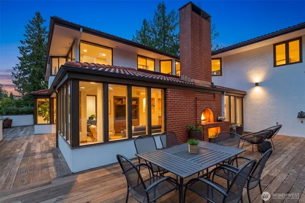 a patio with table and chairs