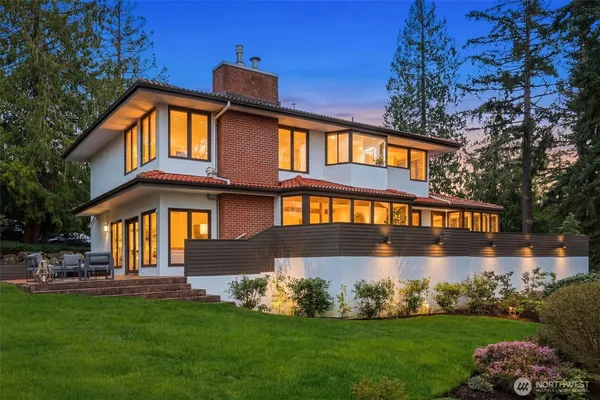 a front view of a house with a garage