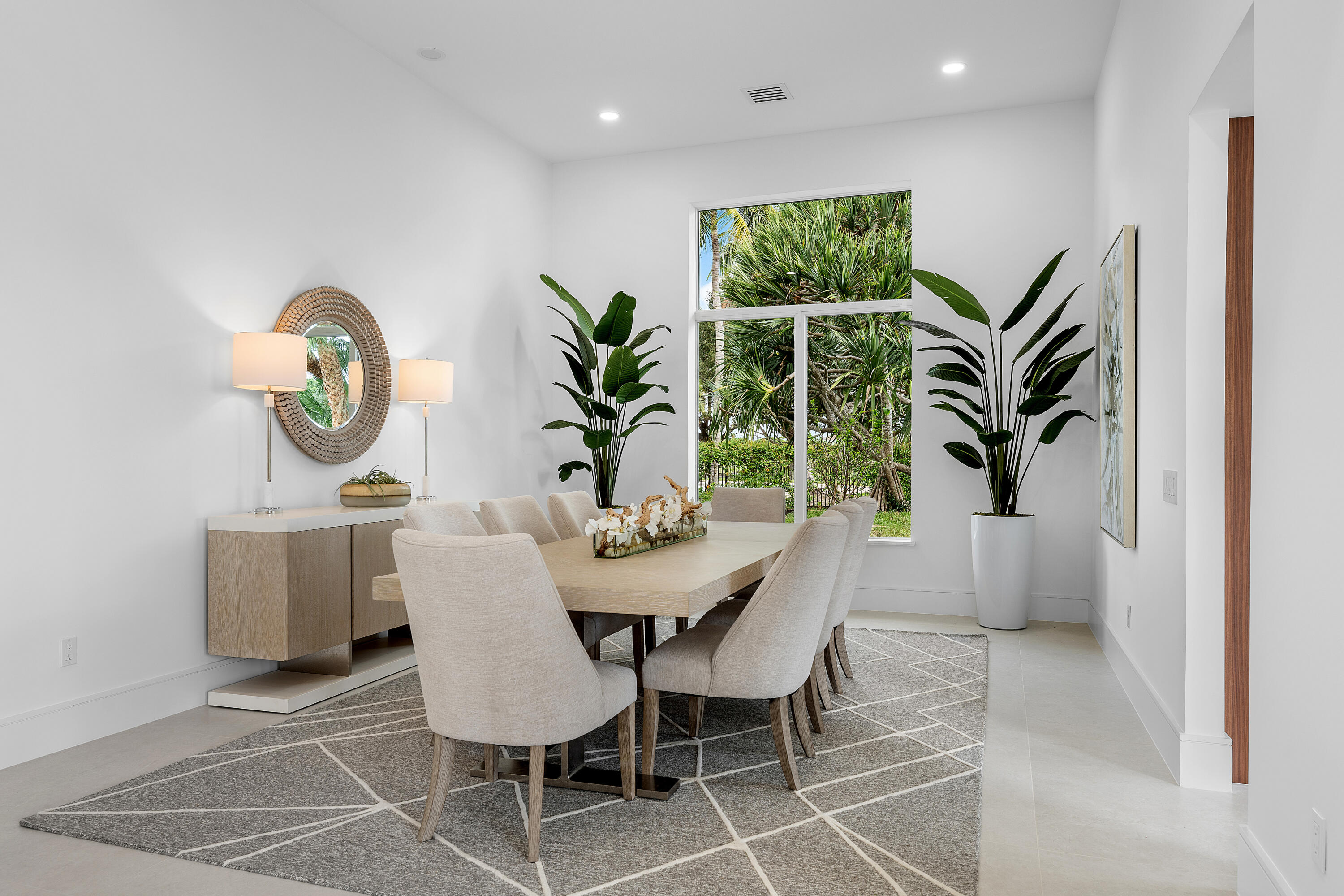 100 Glenbrook Court Atlantis, FL 33462 - Photo 21 of 97 a view of a dining room with furniture window and outside view