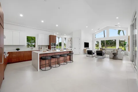 a living room with fireplace furniture and a flat screen tv