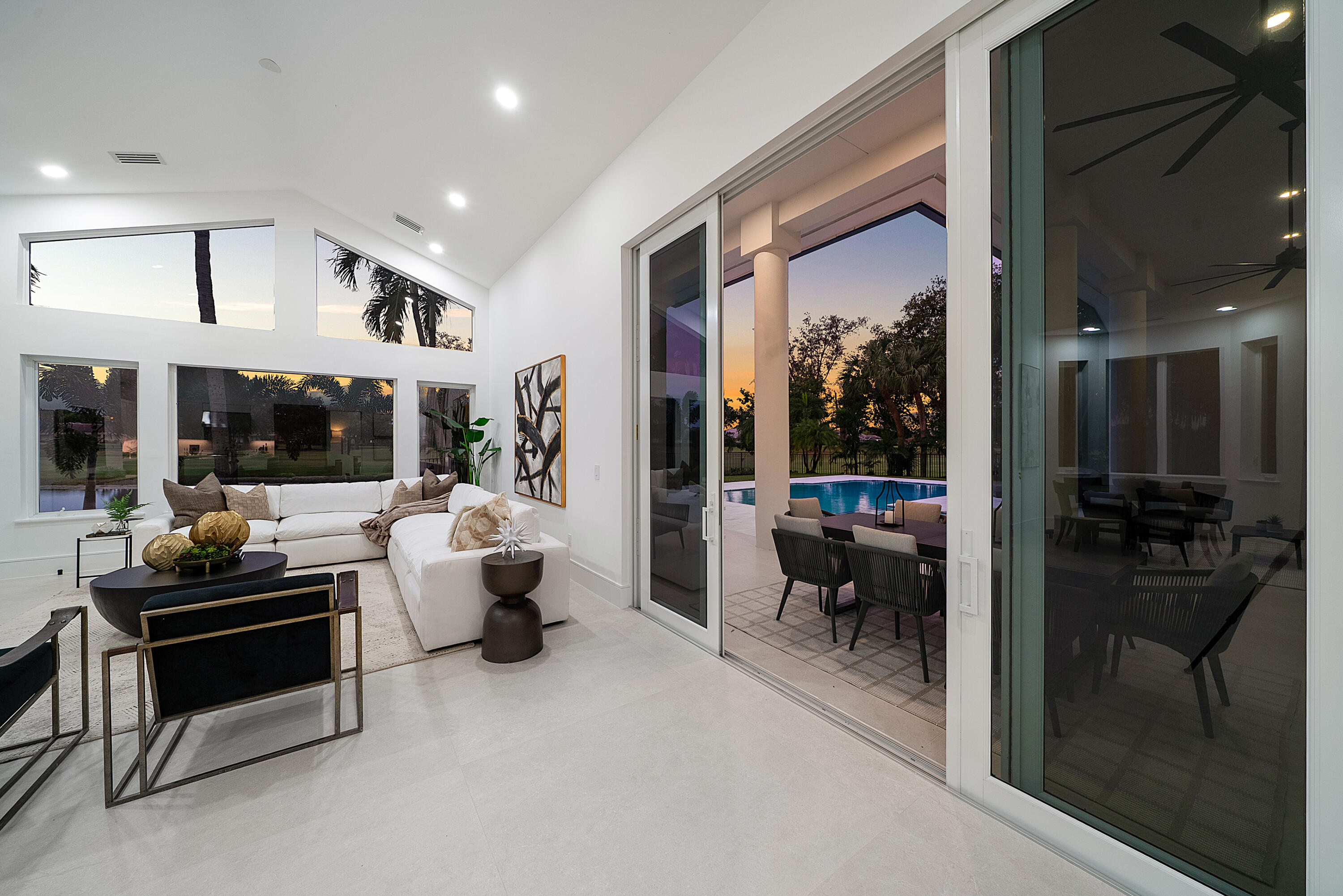 100 Glenbrook Court Atlantis, FL 33462 - Photo 31 of 97 a living room with furniture and a large window