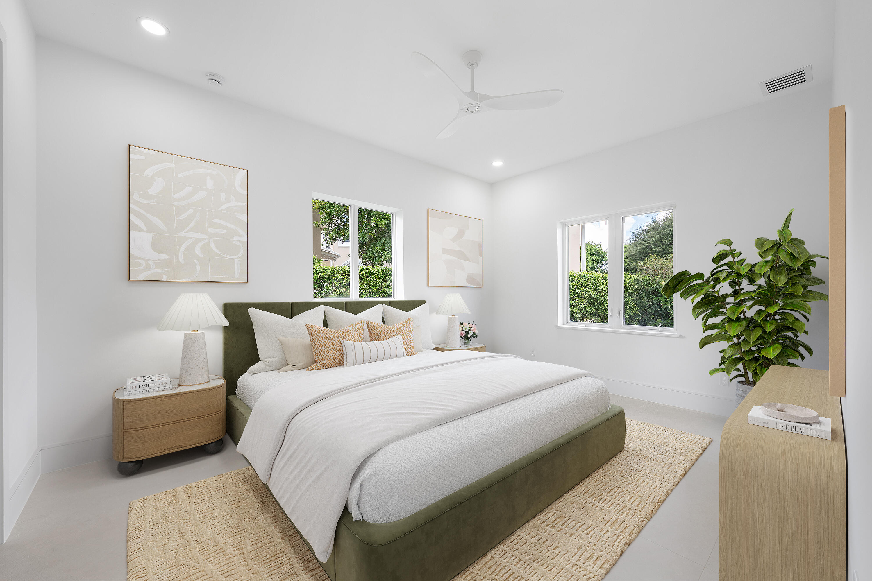 100 Glenbrook Court Atlantis, FL 33462 - Photo 40 of 97 a bedroom with bed and a potted plant