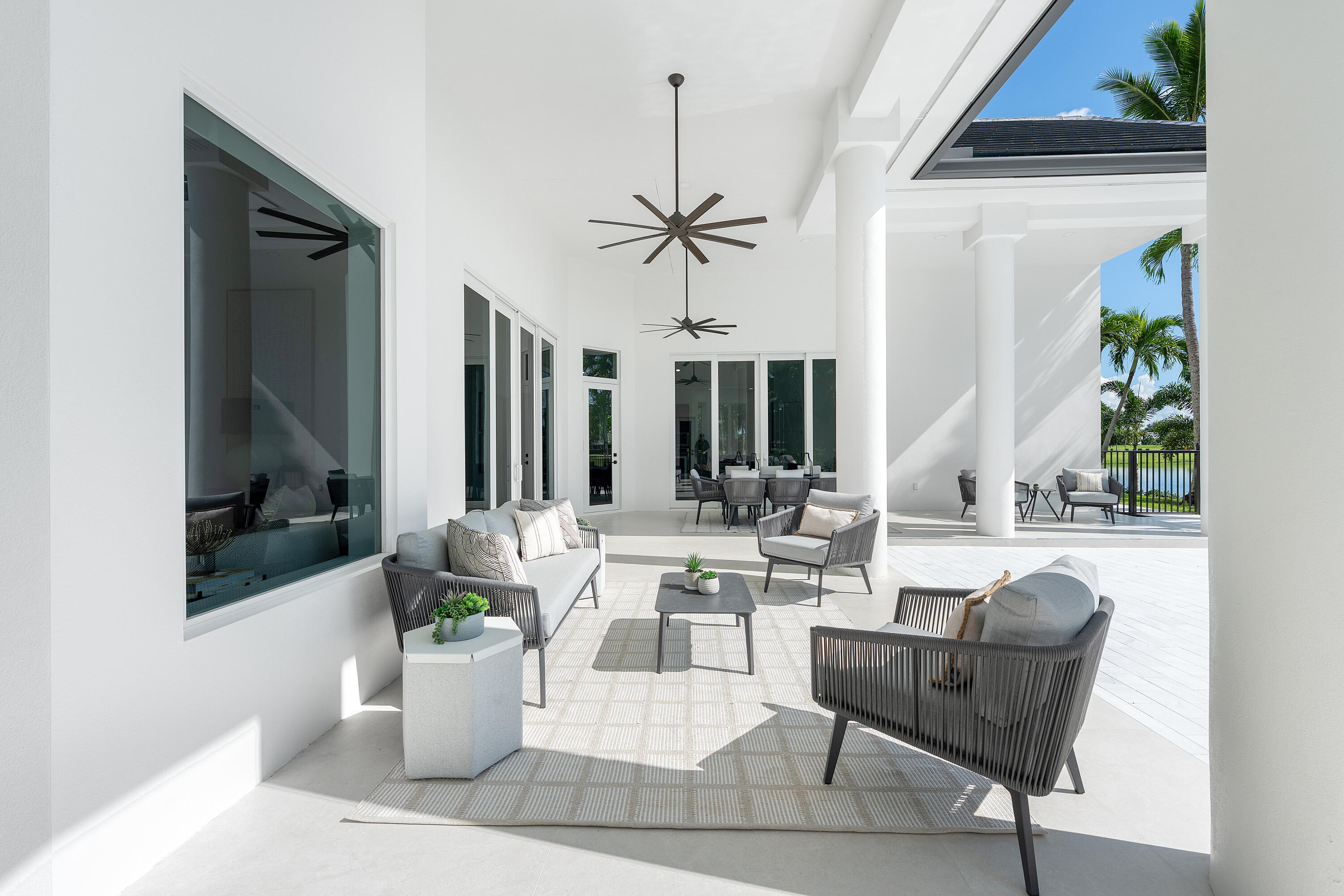 100 Glenbrook Court Atlantis, FL 33462 - Photo 78 of 97 a living room with fireplace furniture and a potted plant