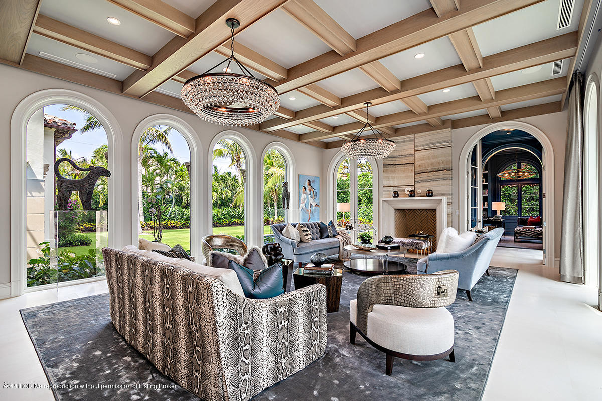 8 Golfview Road Palm Beach, FL 33480 - Photo 2 of 61 a living room with patio furniture and a fireplace