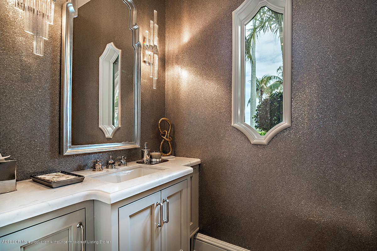 8 Golfview Road Palm Beach, FL 33480 - Photo 20 of 61 a bathroom with a sink and a mirror