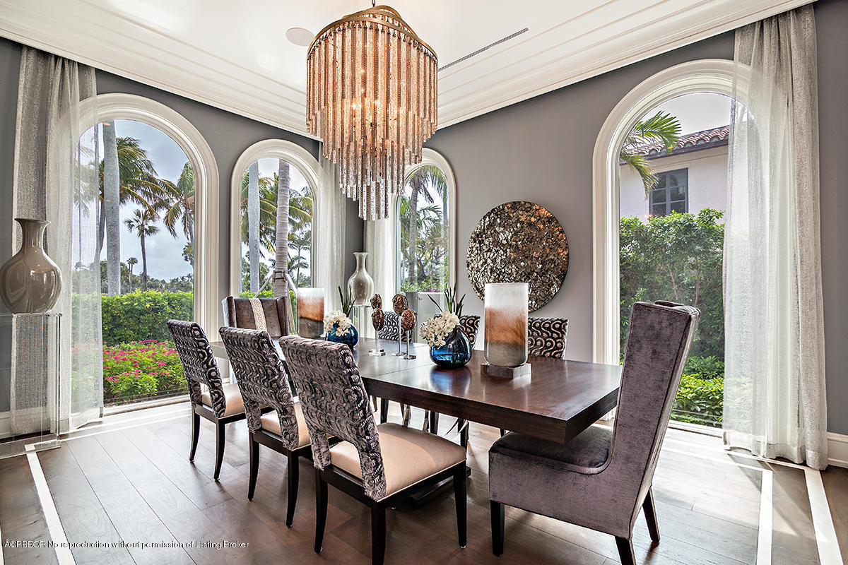 8 Golfview Road Palm Beach, FL 33480 - Photo 21 of 61 a view of a dining room with furniture and a large window