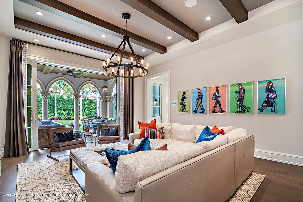 8 Golfview Road Palm Beach, FL 33480 - Photo 23 of 61 a living room with furniture and a floor to ceiling window